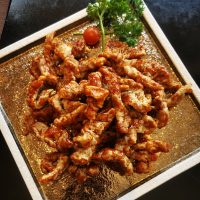 60. Tiras de buey caramelizado